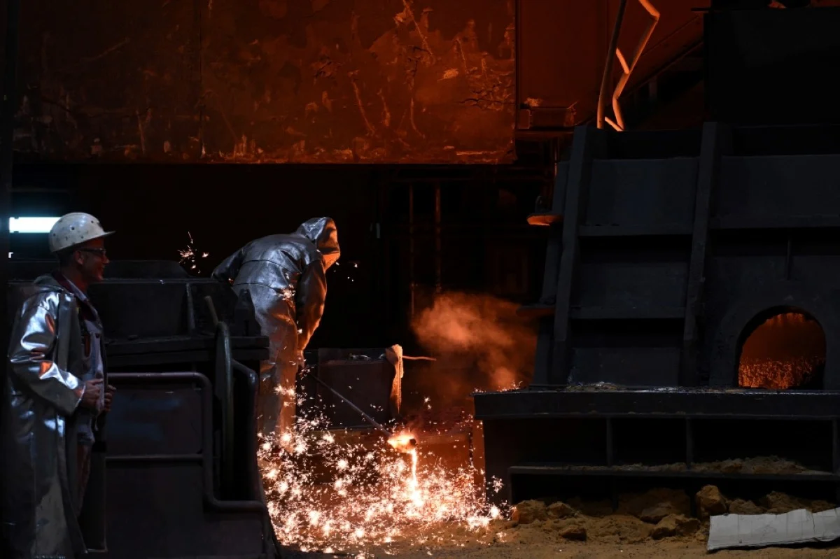 DUISBURG: A steelworker is seen at the blast furnace (Hochofen) Schwelgern at the steel works of Thyssenkrupp Steel Europe AG in Duisburg, western Germany.- AFP