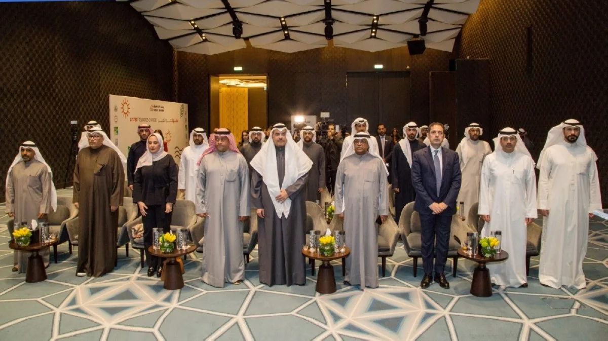 The audience stand up during the national anthem.