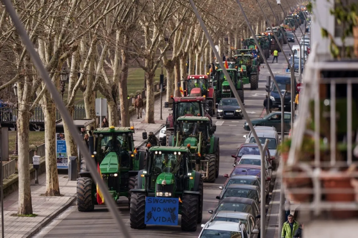 Spanish farmers drive their tractors during a protest in demand of fair conditions for the agricultural sector, in Burgos, northern Spain, on February 6, 2024. --AFP