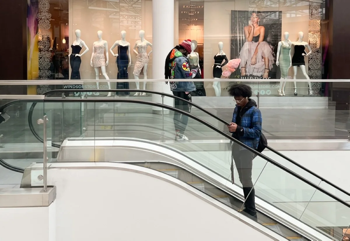 WASHINGTON: Shoppers walk through the Fashion Centre at Pentagon City, a shopping mall in Arlington, Virginia. – AFP
