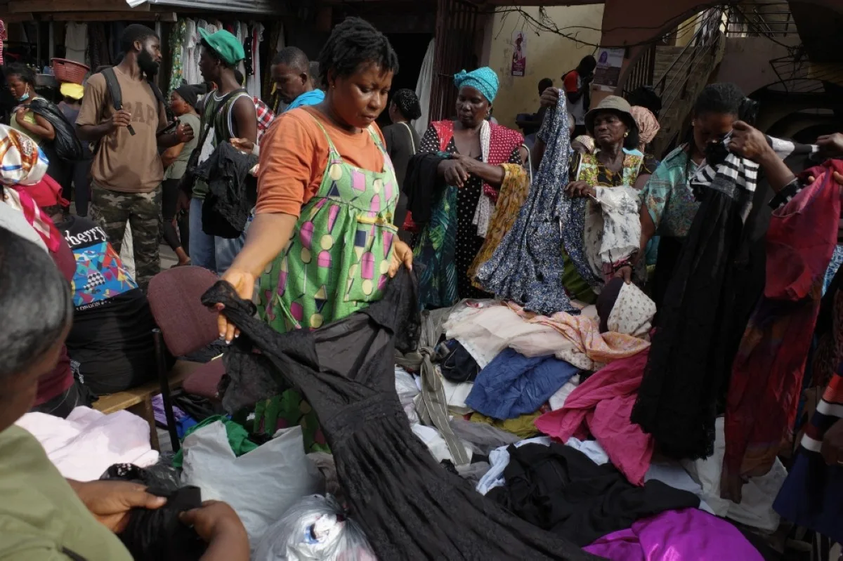 ACCRA, Ghana: People go through secondhand clothes at the Kantamanto market in Accra, Ghana. – AFP
