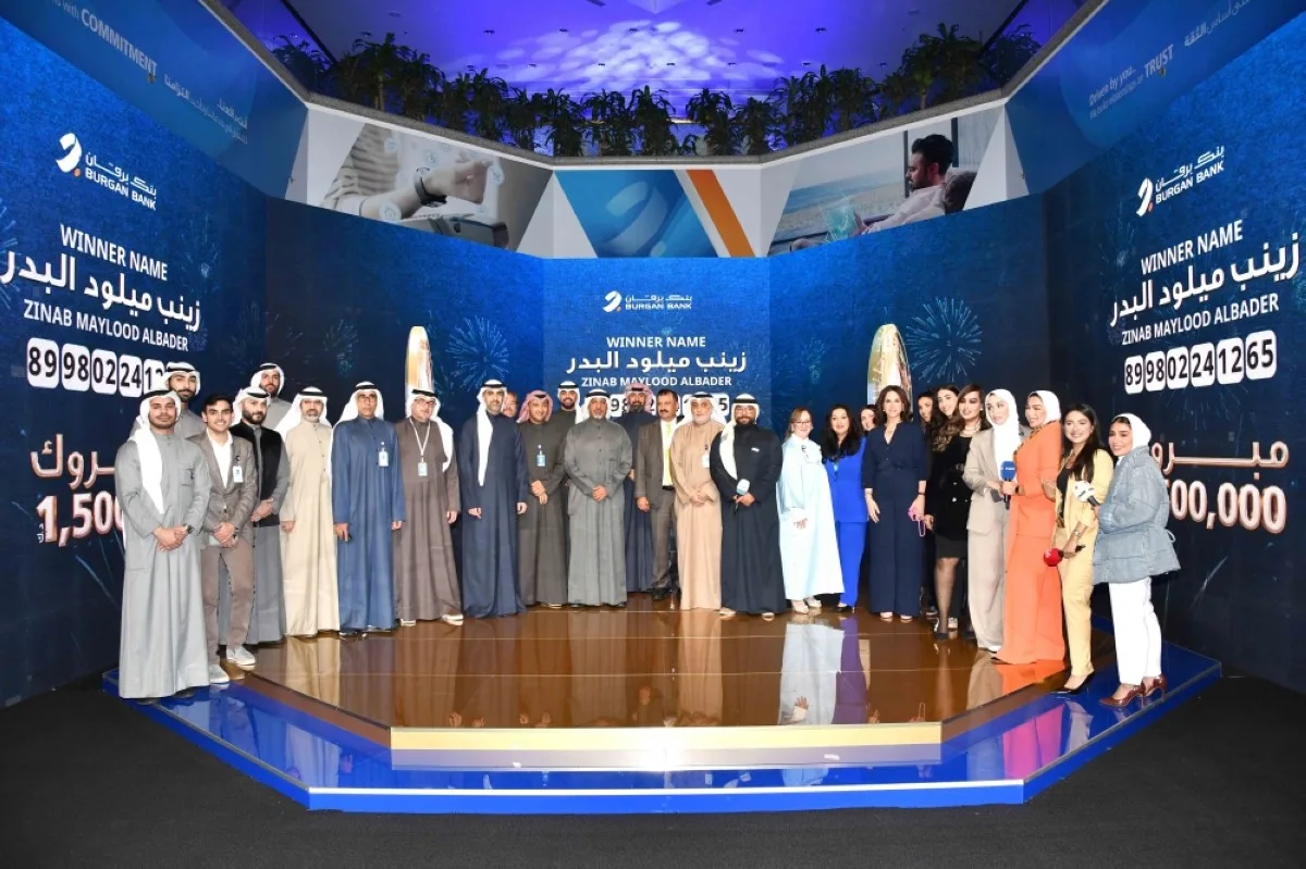 Burgan Bank’s top management stands for a group photo during the celebration.