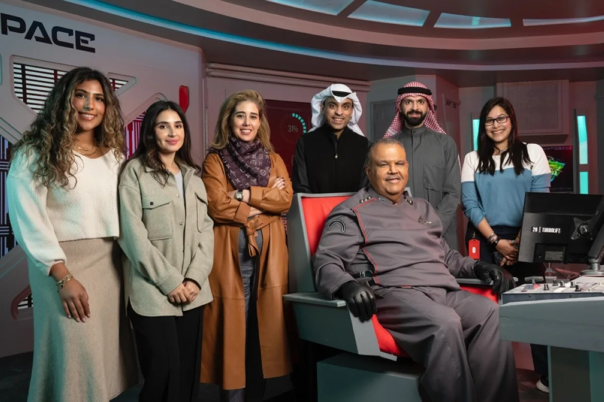 Gulf Bank’s marketing team poses for a photo with Nabil Shuail.