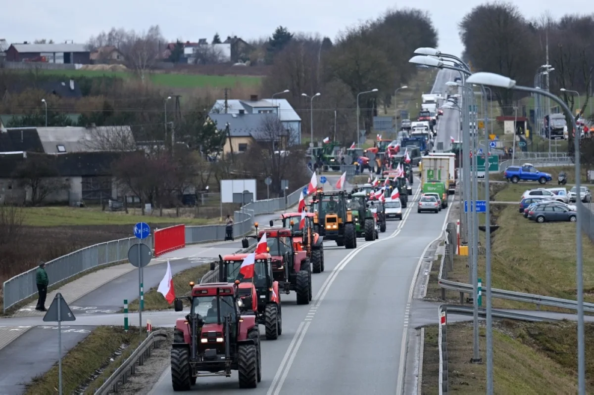 Polish farmers with their tractors and vehicles arrive to block the highway linking Warsaw and Lublin outside the town of Ryki, Lublin region, during a protest of farmers across the country against EU climate measures on Feb 20, 2024. – AFP