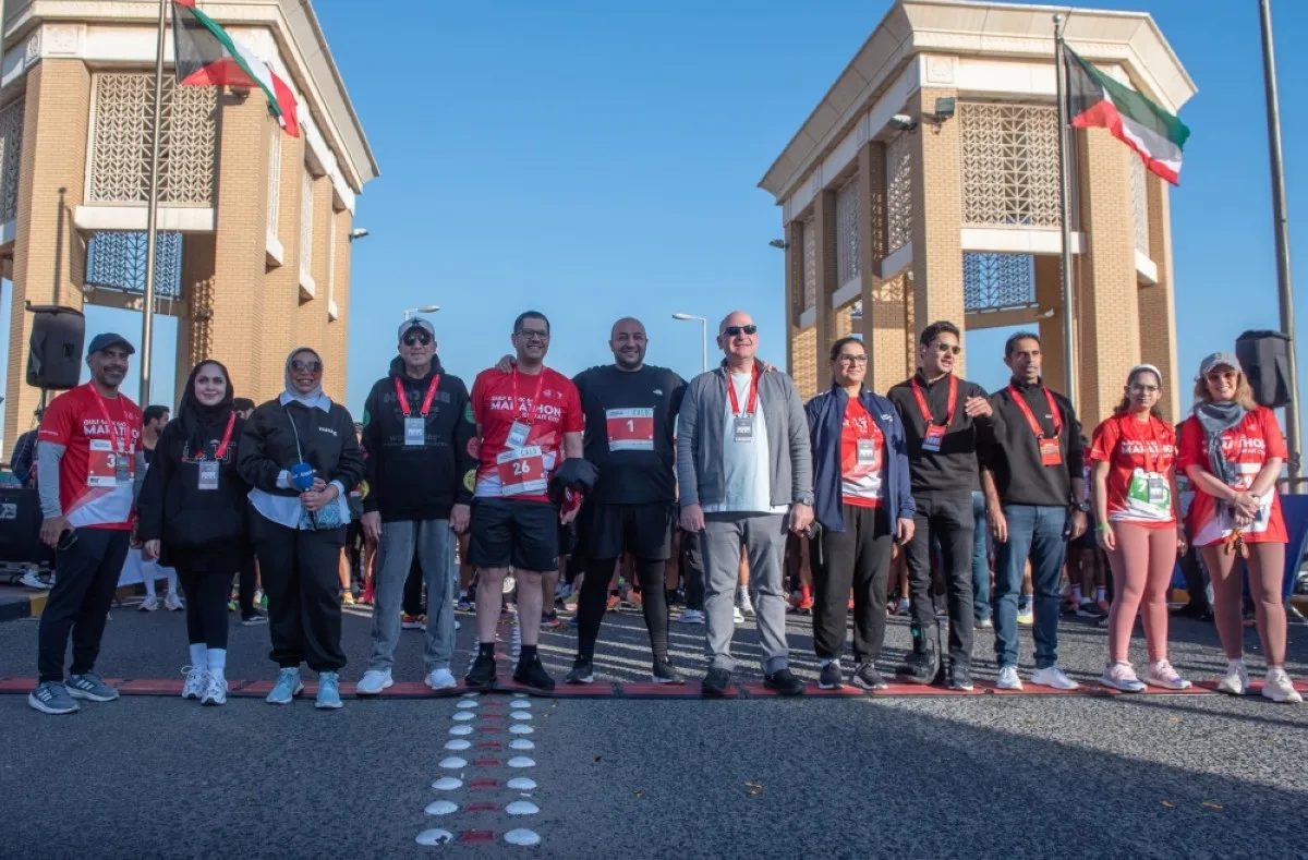 Minister of Youth Dawood Marafie poses for a photo with Gulf Bank executive management officials.
