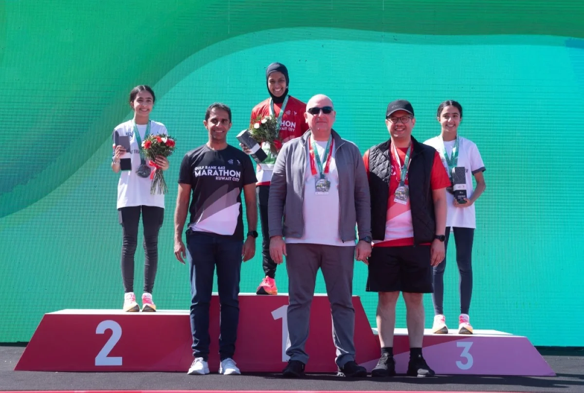 Waleed Khaled Mandani, Mohammed Al-Qattan and Ahmed Al-Majed with some of the winners.