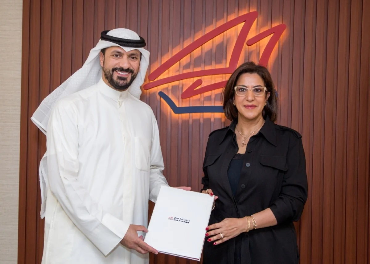 Ahmad Al-Amir and Laila Hilal Al-Mutairi after renewing the partnership contract.