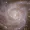 This undated handout shows an alternative crop of an astronomical image of spiral galaxy IC 342 taken during ESA's Euclid space mission, which is built and operated by the European Space Agency ESA and with contributions from NASA. - 