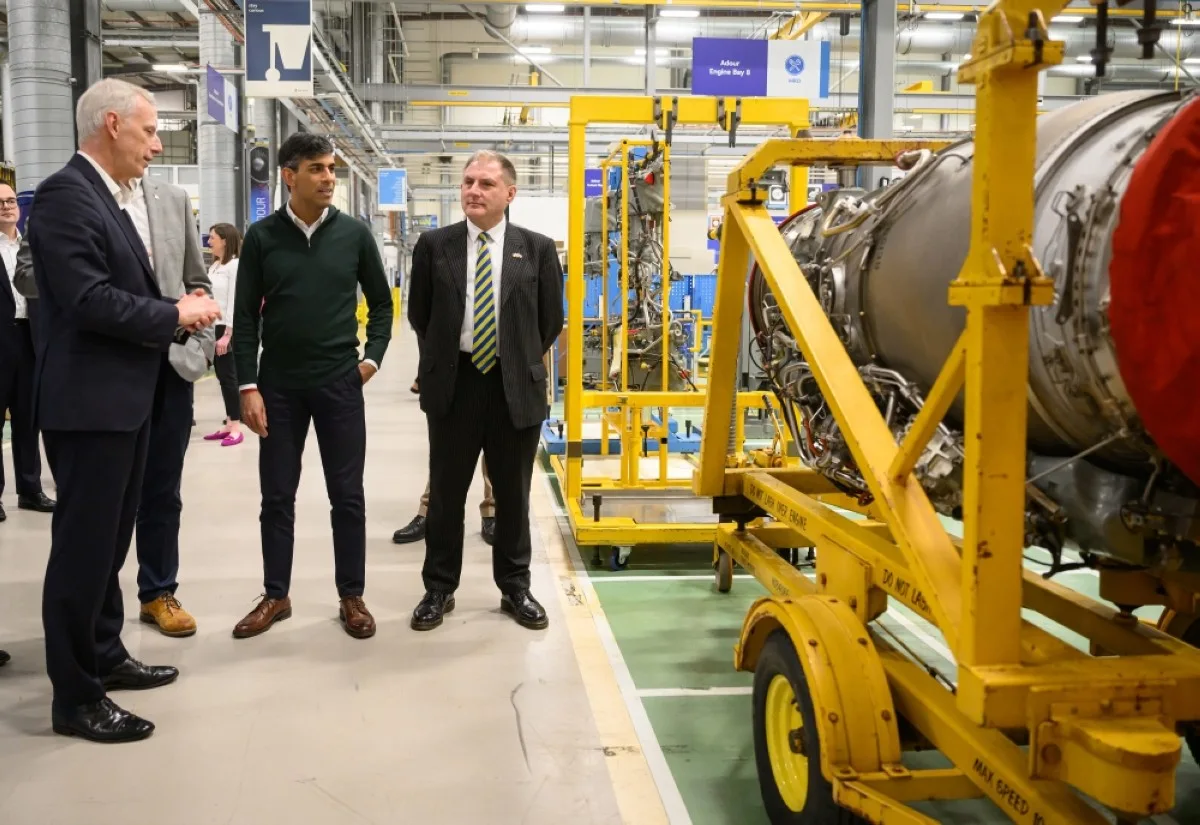 BRISTOL: Britain's Prime Minister Rishi Sunak (second left) and Rolls-Royce Group President Chris Cholerton look towards an engine during a visit to the Rolls-Royce manufacturing facility in Bristol. – AFP