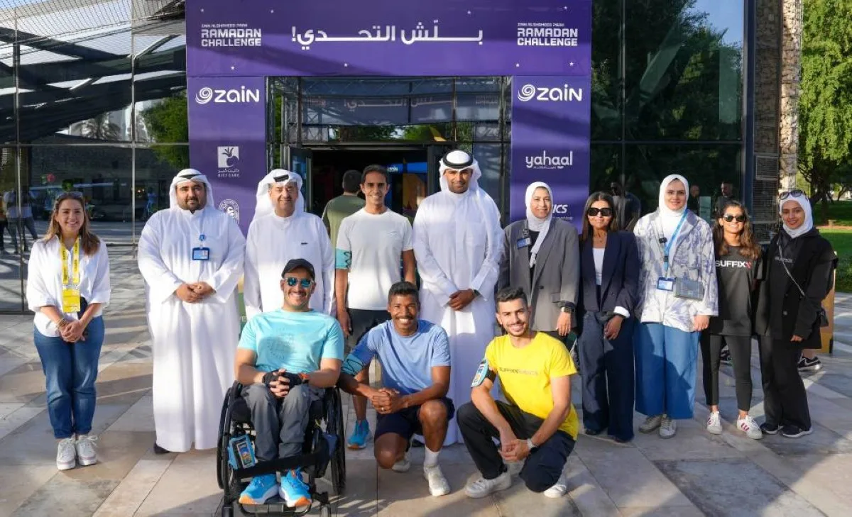 Waleed Al Khashti and Ahmad Al Majed with Zain and Suffix teams.