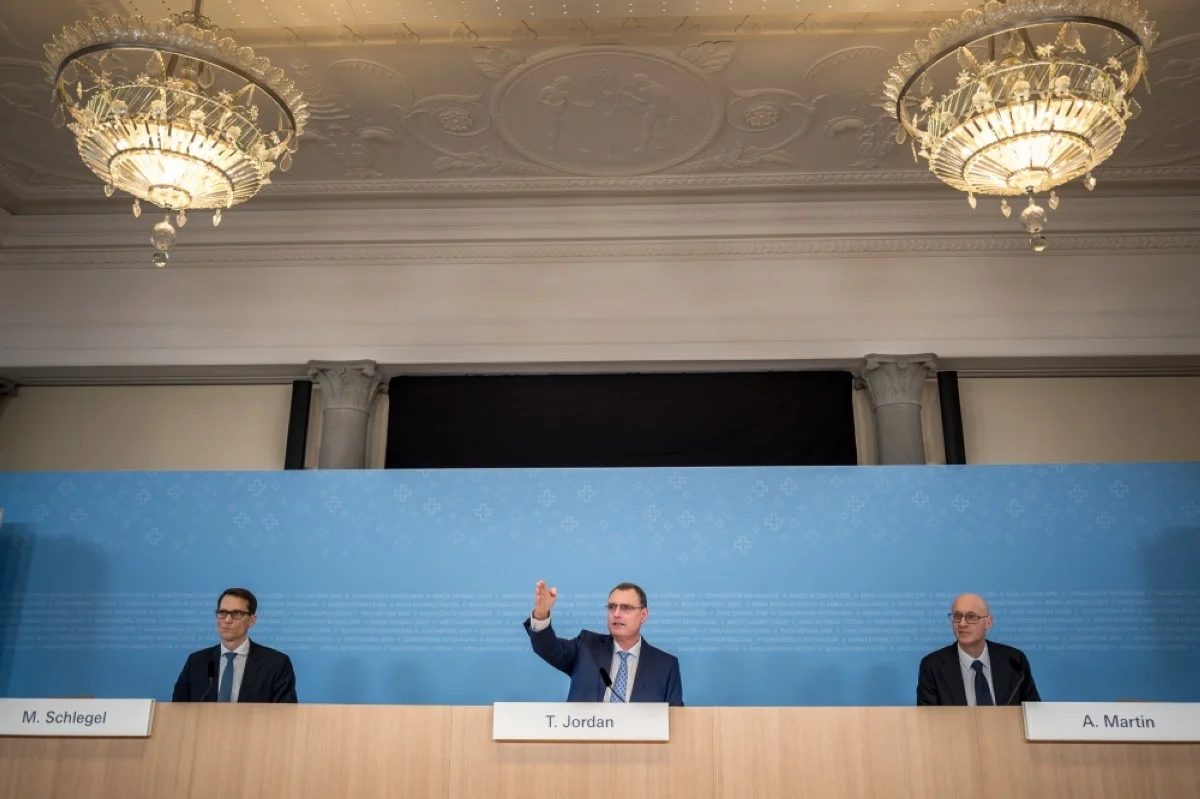 ZURICH: Chairman of Swiss National Bank (SNB BNS) Thomas Jordan (center) gestures next to Vice Chairman Martin Schlegel (left) and board member Antoine Martin during a press conference on March 21, 2024. – AFP