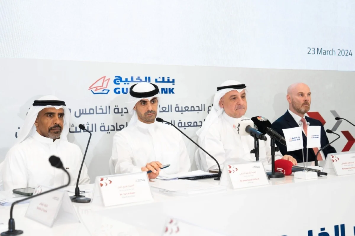 Chairman of the Board of Directors at Gulf Bank Bader Nasser Al-Kharafi (second left) chairs the general assembly meeting.