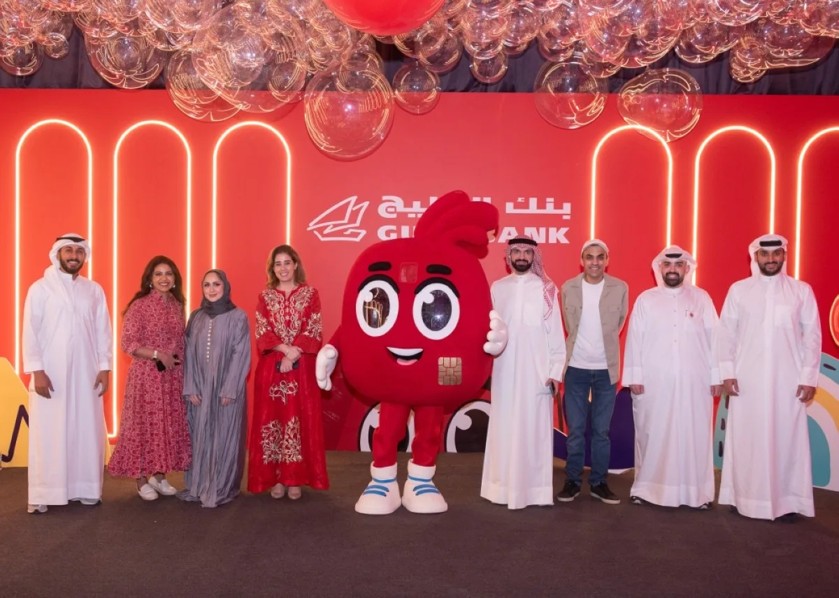 Najla Al-Eisa poses for a photo with Gulf Bank team.