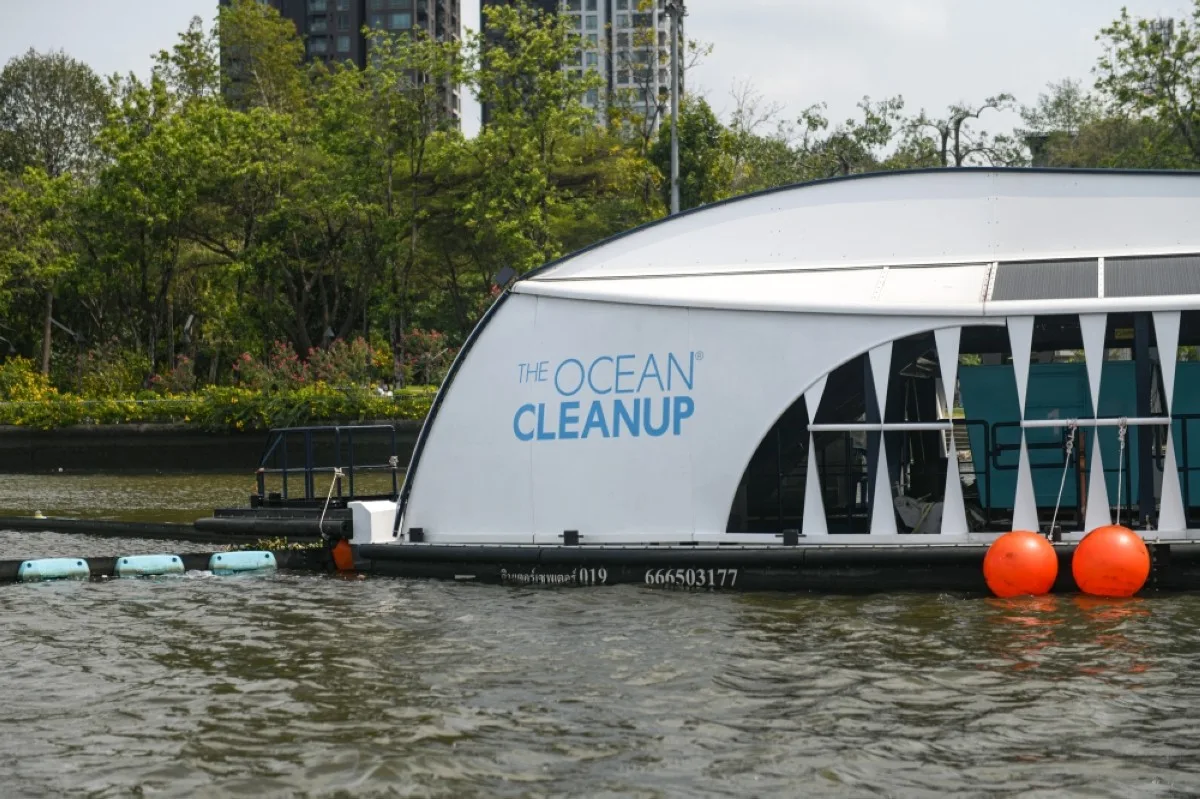 BANGKOK: The Ocean Cleanup's Interceptor which captures floating plastic and trash before it reaches the ocean is seen during a press visit on the Chao Phraya river in Bangkok on March 26, 2024. -- AFP