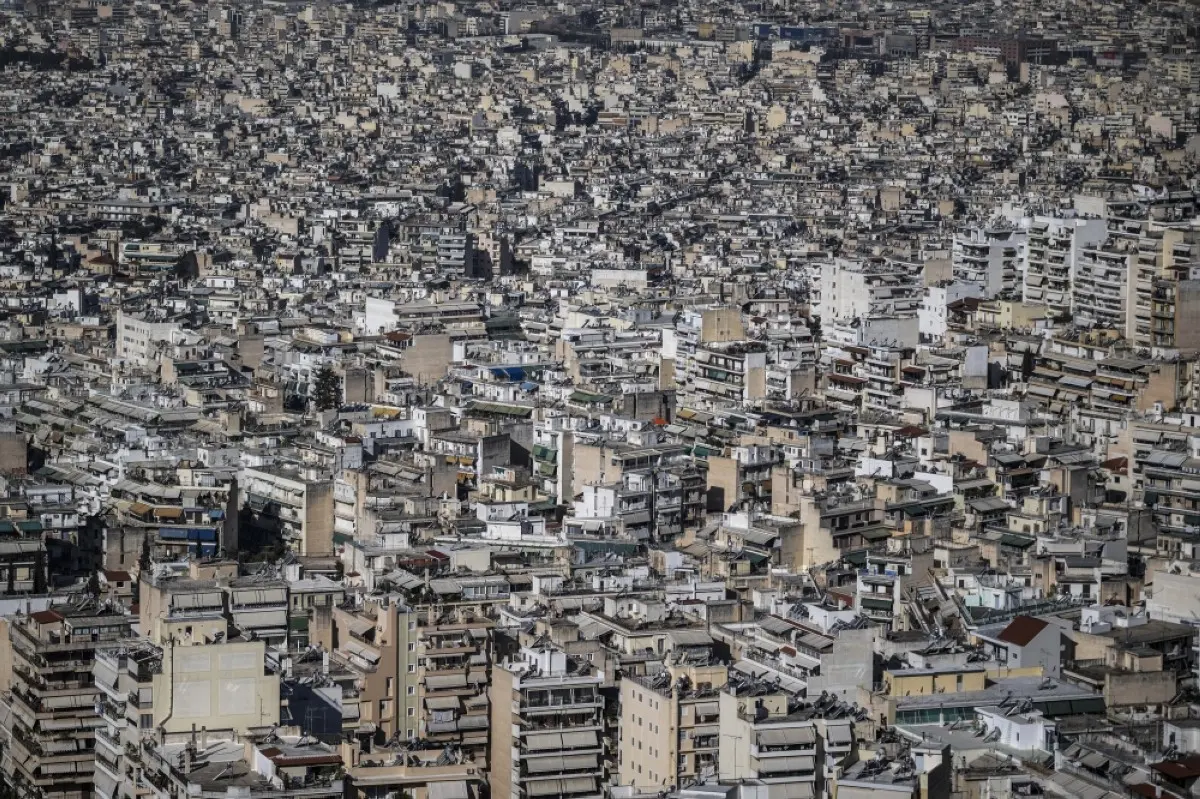 ATHENS: This aerial photograph taken on March 30, 2024 shows the buildings in Athens. Greece tightened its Golden Visa rules raising the required investment total for a third national to secure the residence permit to 250,000-800,000 euros in an effort to alleviate the country’s housing crisis. -- AFP