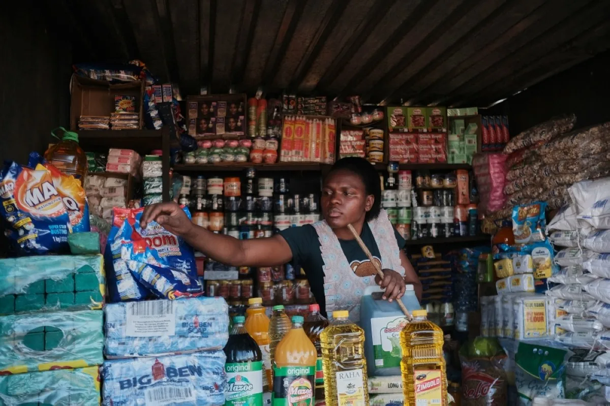 HARARE: A vendor sells goods at Mbare Musika in Harare. – AFP
