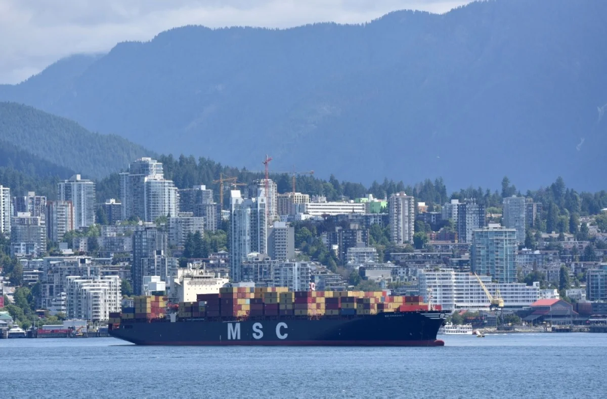 VANCOUVER: A container ship sits in Burrard Inlet in front off the coast of North Vancouver.- AFP