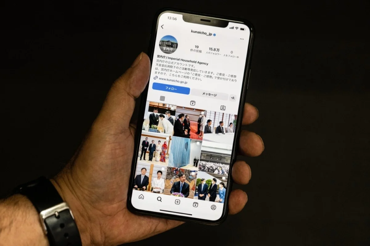 TOKYO: This photo illustration shows a mobile phone displaying the Instagram account of the Imperial Household Agency of Japan.- AFP