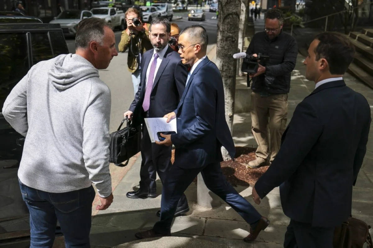 SEATTLE, US: Former Binance CEO Changpeng "CZ" Zhao (center) departs federal court in Seattle, Washington, on April 30, 2024. -- AFP