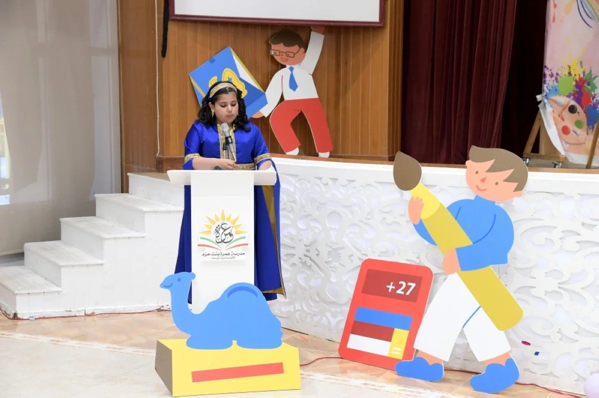 One of the students explaining the features of the program.