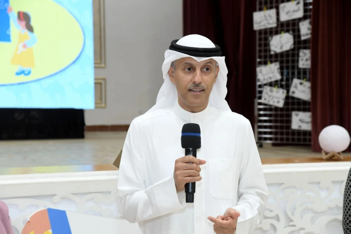 Sulaiman Al-Marzouq speaks during the program.