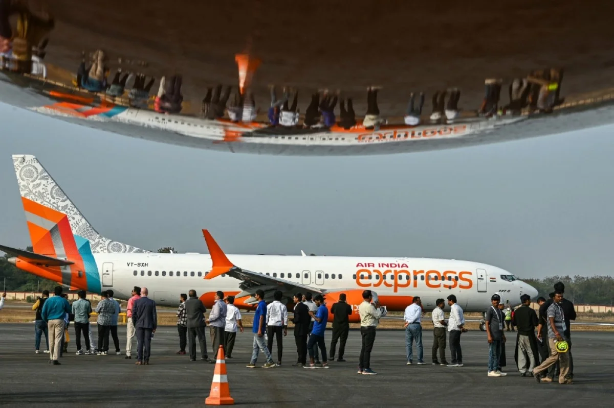 HYDERABAD: Visitors gathered near an Air India Express Boeing 737-8 aircraft during the ‘Wings India 2024’, an exhibition and conference on civil aviation, at the Begumpet Airport in this file photo. – AFP