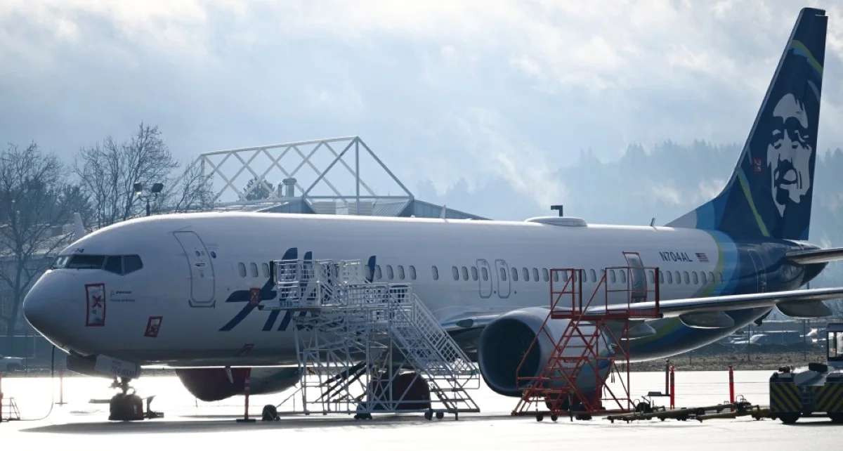 PORTLAND, United States: Alaska Airlines N704AL, a 737 Max 9, which made an emergency landing at Portland International Airport on January 5 is parked on the tarmac in Portland, Oregon, on January 23, 2024. — AFP