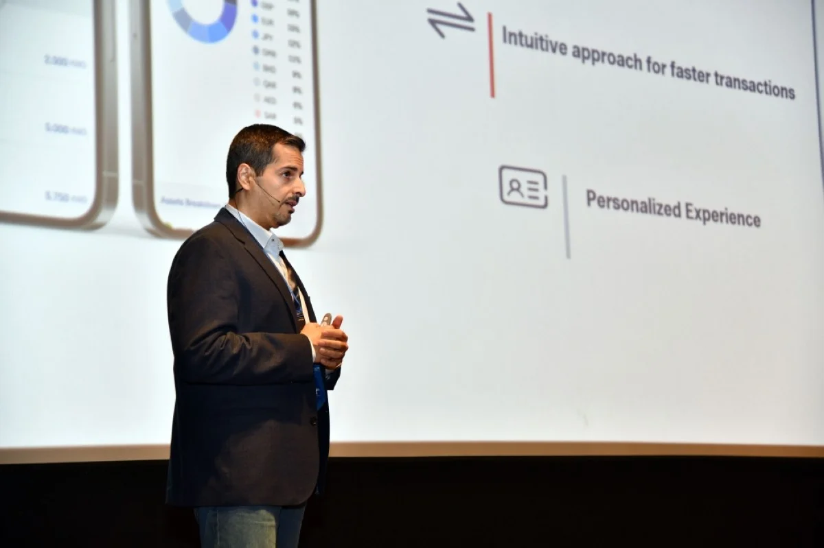 Chief Operating Officer at NBK Mohammad Al-Kharafi delivers a lecture.