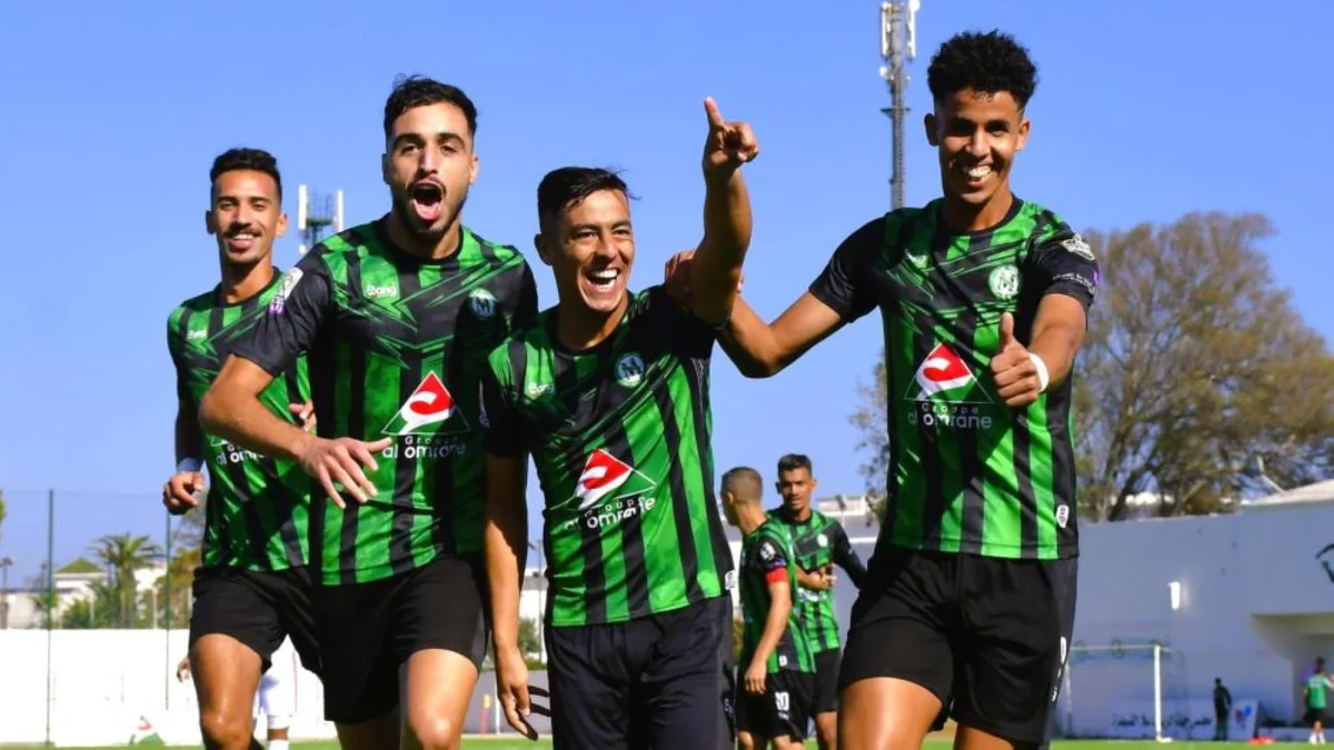 Les joueurs du Stade marocain célébrant leur victoire sur le Kawkab de Marrakech.