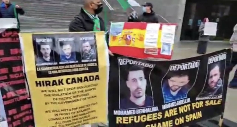 Algerians in front of the Spanish Embassy in Montreal. 