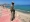 جندي يمني يقف على ساحل مدينة المكلا جنوب اليمن (رويترز)