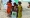 أطفال بلحج يتسلمون مساعدات سعودية                     (واس)