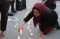 






مسلمة تضيء الشموع خلال وقفة لضحايا المسجدين (د ب أ)