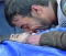 






 سوري يبكي على جثة والده الذي قُتل في هجوم بقذائف تركيا    (د ب أ)