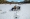 امرأة تصطاد في بحيرة فنتون المجمدة في جبال جيميز بأمريكا، وذلك خلال موسم الصيد في الجليد للعام الجديد
