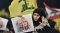






عناصر من حزب الله ترفع صور سليماني   (مكة)