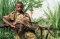 


طفل سوداني يحمل سلاحا                                          (مكة) 