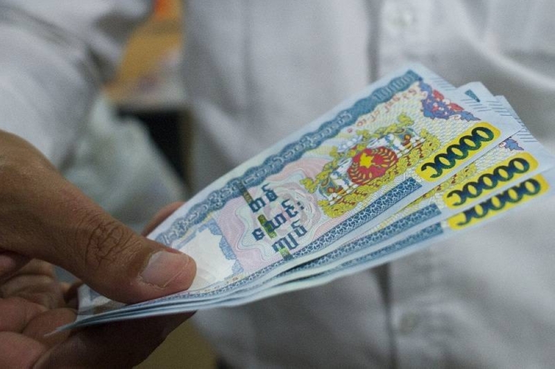 Myanmar’s economy has been in crisis since the military seized power last year, halting a decade of political and economic reforms and piling pressure on the kyat's exchange rate against the US dollar. ― AFP pic Myanmar’s economy has been in crisis since the military seized power last year, halting a decade of political and economic reforms and piling pressure on the kyat's exchange rate against the US dollar. ― AFP pic