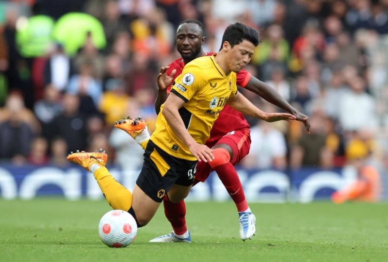 Wolverhampton Wanderers’ Hwang Hee-Chan in action with Liverpool’s Naby Keita during their Premier League match at Anfield, Liverpool, May 22, 2022. — Reuters pic