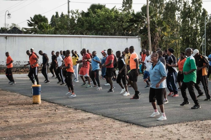 People participate in fitness training at outdoor courts before sunset in Bujumbura, Burundi, on March 15, 2022. — ETX Studio pic