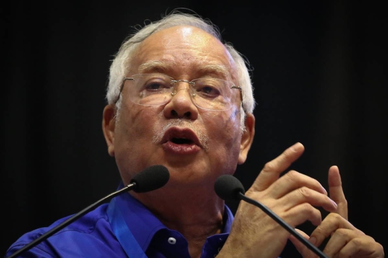 Datuk Seri Najib Razak delivers his speech during a Barisan Nasional convention at World Trade Centre in Kuala Lumpur June 1, 2022. — Picture by Yusof Mat Isa