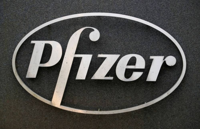 The Pfizer logo is seen at the entrance to Pfizer UK headquarters in Tadworth December 2, 2020. — Reuters pic
