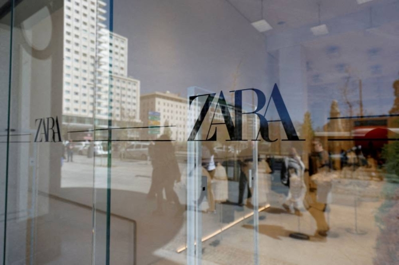 Zara's logo is displayed on a window, at one of the company's largest stores in the world, in Madrid April 7, 2022. — AFP pic