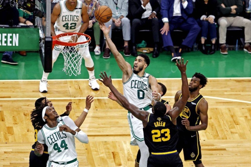 Boston Celtics forward Jayson Tatum (0) shoots the ball against Golden State Warriors forward Draymond Green (23) during game three of the 2022 NBA Finals at TD Garden, Boston June 8, 2022. — Reuters pic