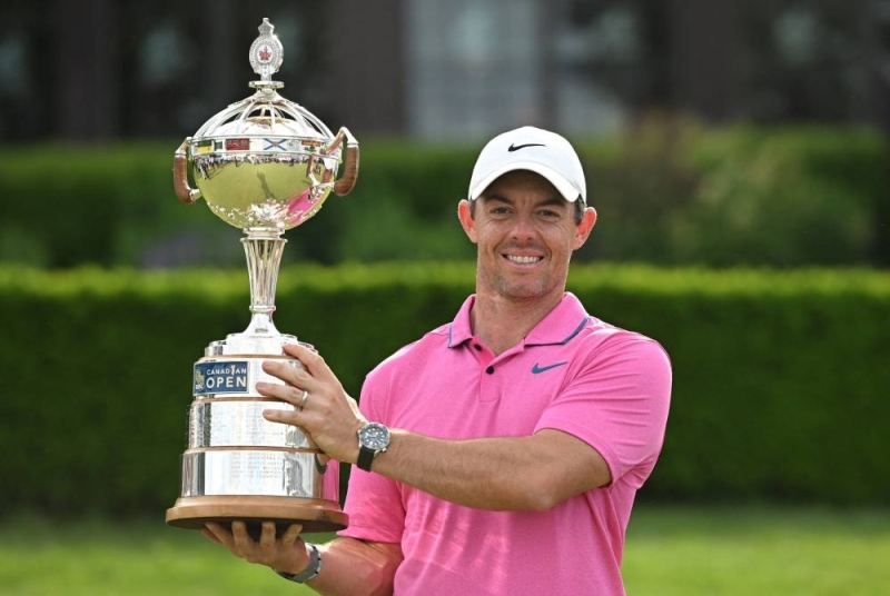 Rory McIlroy holds the RBC Canadian Open trophy after winning the RBC Canadian Open golf tournament. — Dan Hamilton-USA TODAY Sports