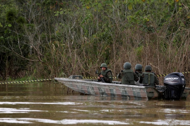 Brazilian soldiers sit on a boat during the search operation for British journalist Dom Phillips and indigenous expert Bruno Pereira in Atalaia do Norte, Amazonas state, Brazil June 13, 2022. — Reuters pic