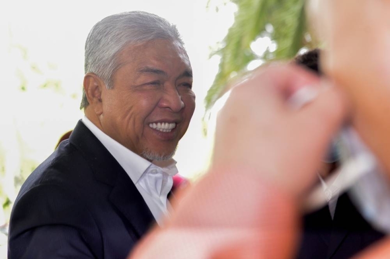 Datuk Seri Zahid Hamidi arrives for his corruption trial at Shah Alam High Court on June 14, 2022. — Picture by Miera Zulyana