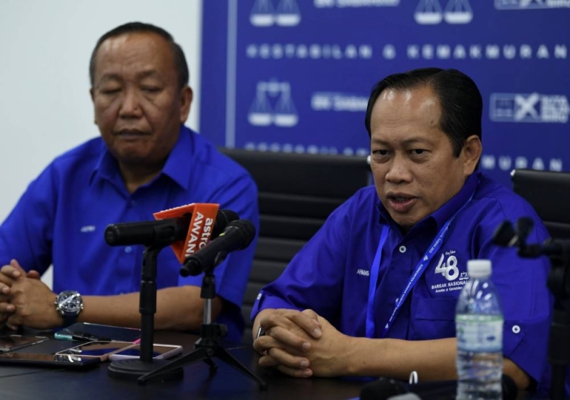 Umno secretary -general Datuk Seri Ahmad Maslan (right) during a press conference in conjunction with the Sabah Barisan Nasional Convention at the Penampang Commercial and International Center (ITCC) in Kota Kinabalu, July 2, 2022. — Bernama pic