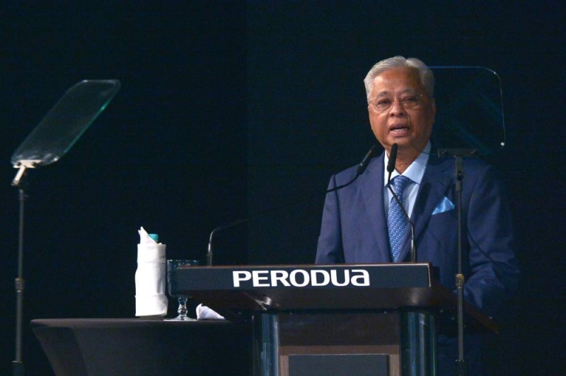 Prime Minister Datuk Seri Ismail Sabri Yaakob delivers his speech at the launch of the all new Perodua Alza at the Kuala Lumpur Convention Centre July 20, 2022. — Picture by Shafwan Zaidon