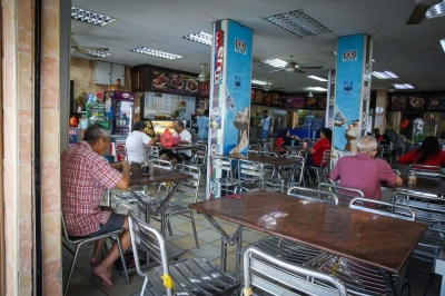 SMEs’ complaint of labour shortage slows down the return of ‘business is as usual’  Mamak shops like this one cannot operate longer hours because of a shortage of workers. — Picture by Shafwan Zaidon